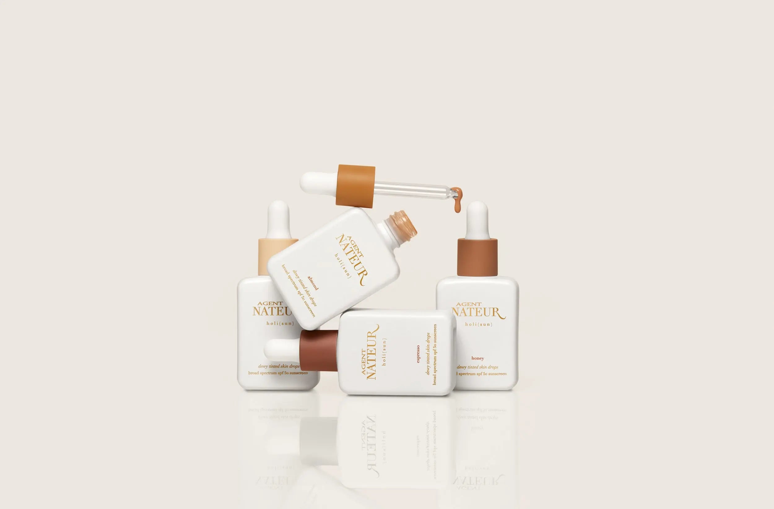 holi (sun) spf 50 dewy tinted skin drops 1